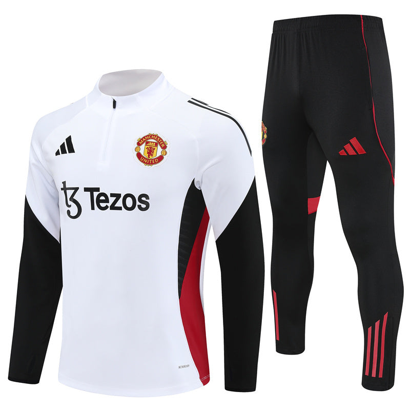 CONJUNTO LARGO MANCHESTER UNITED ENTRENAMIENTO 25/26 HOMBRE