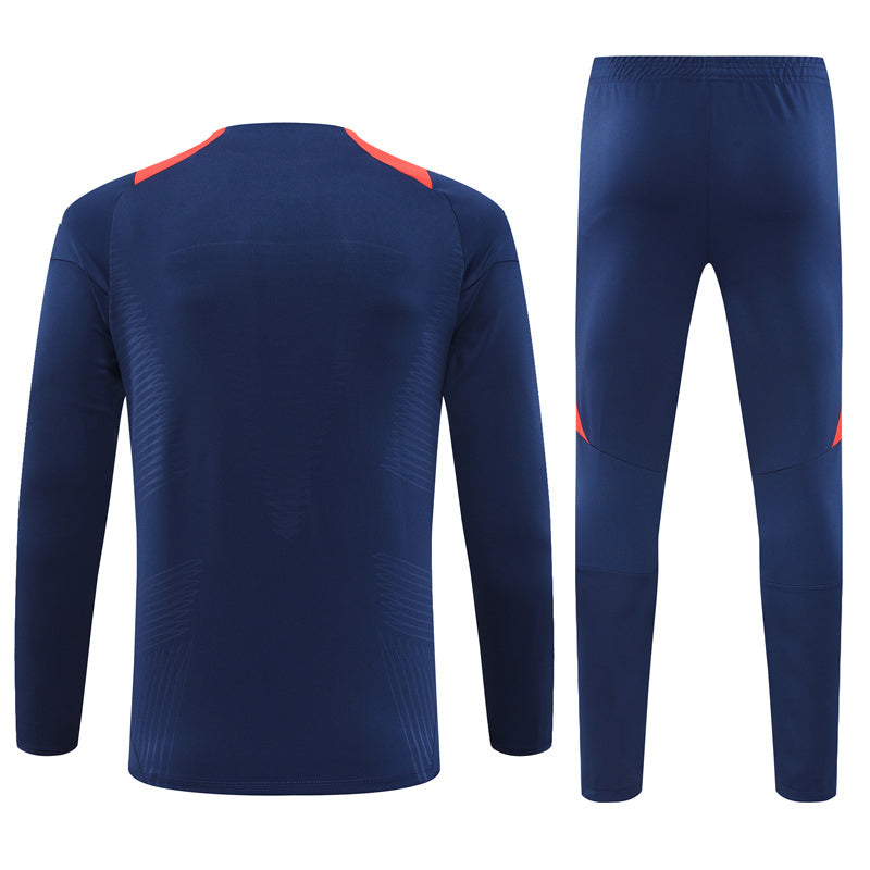 CONJUNTO LARGO MANCHESTER UNITED ENTRENAMIENTO 24/25 HOMBRE